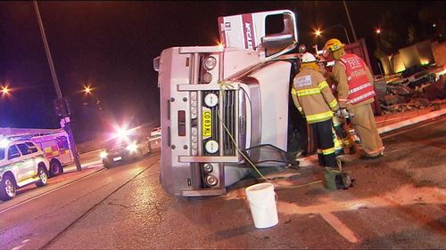 A B-double truck has rolled over on a busy Adelaide intersection. Picture: 9NEWS