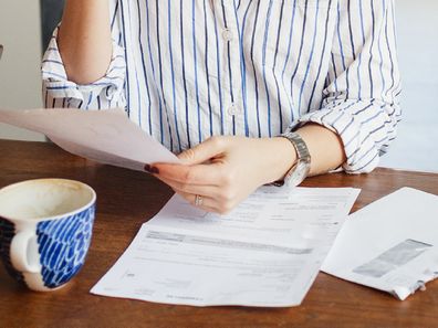 Woman paying bills