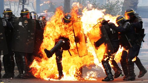 Four police officers were hurt in clashes in Paris on May 1. (AFP)