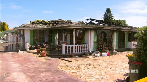 The young boy and his parents escaped the fire with one of their pet dogs, but the other perished inside the property. (9NEWS)
