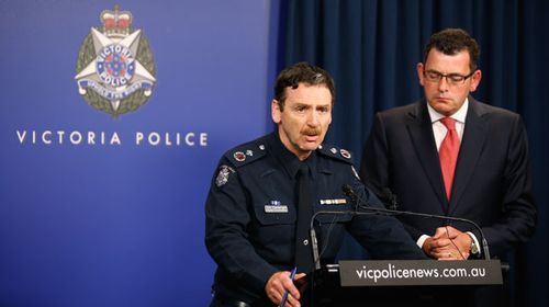 Victoria Police Deputy Commissioner Tim Cartwright with Victorian Premier Daniel Andrews speak to the media in relation to the Sydney hostage incident. (Gety)