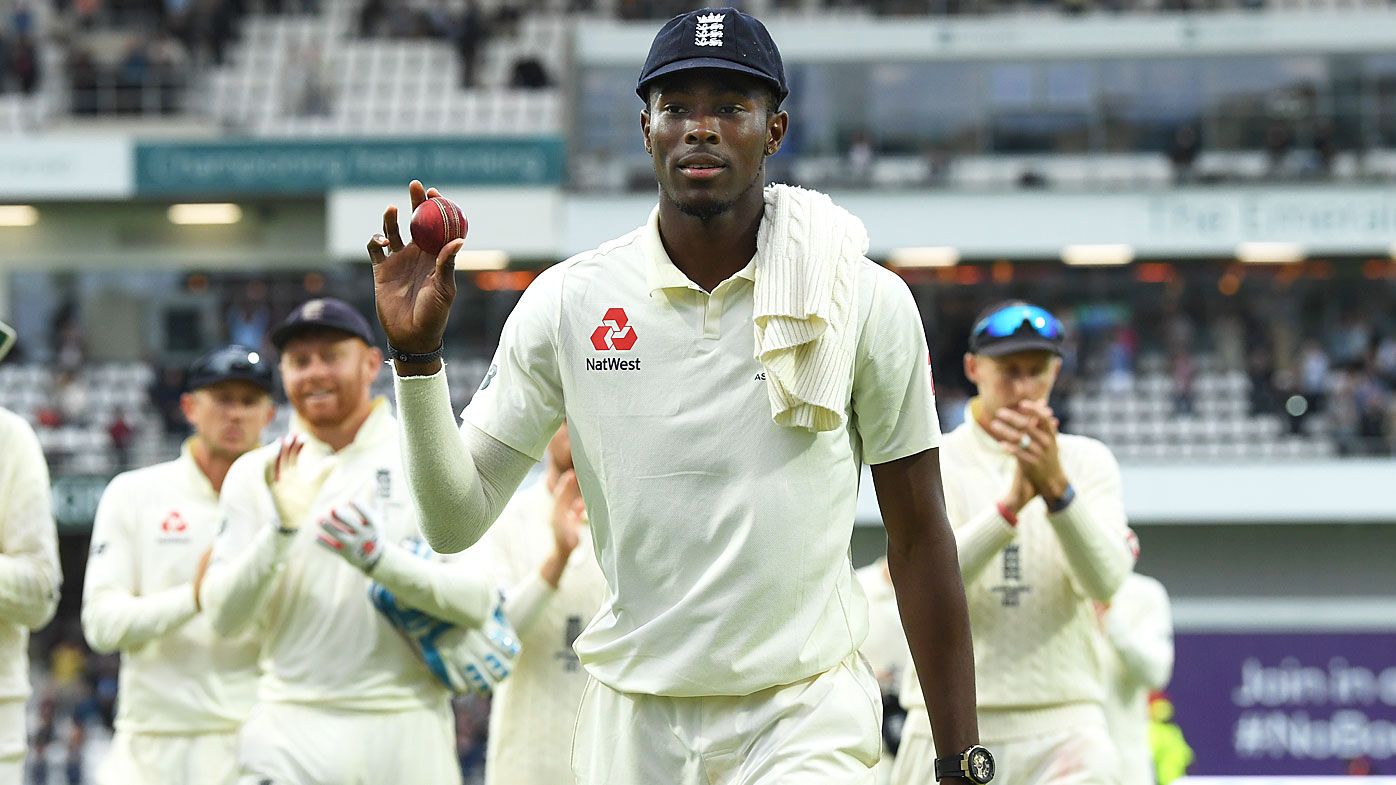 England bowler Jofra Archer leaves the field holding the ball after claiming 6 wickets during day one of the 3rd Ashes Test at Headingley