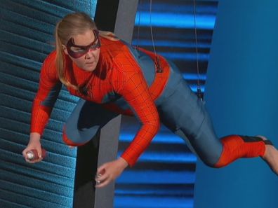 Amy Schumer dresses up as Spiderman during the 2022 Oscars