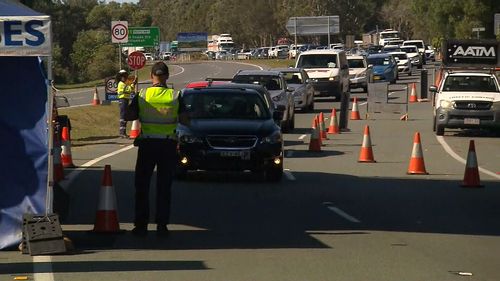 Queensland border delays lengthening as motorists line-up to get into the state.