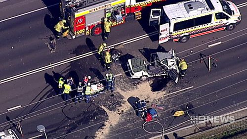 Firefighters hosed down the tanker as they drained out the LPG. (9NEWS)