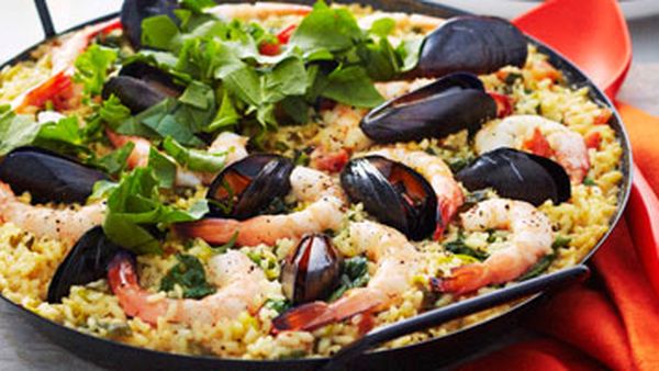 Seafood paella with rocket