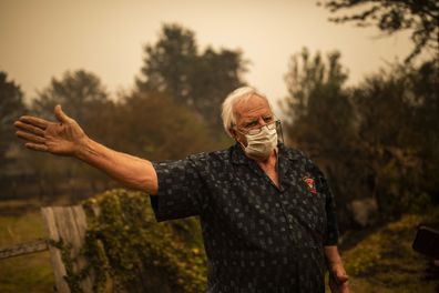 Roland (Roly) Hough in Cobargo, NSW, Wednesday, January 1, 2020. Several bushfire-ravaged communities in NSW have greeted the new year under immediate threat. (AAP Image/Sean Davey) NO ARCHIVING