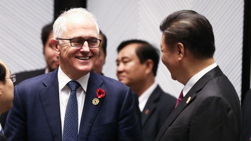 Prime Minister Malcolm Turnbull speaks with Chinese President Xi Jinping during the leaders' retreat at the Asia-Pacific Economic Cooperation (APEC) Summit. (AAP)