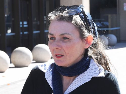 Axe attack victim Sharon Hacker's injuries could have been fatal if her thick dreadlocks didn't cushion the blow.