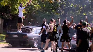 A large-scale hooning event forced the closure of a Queensland street this afternoon.