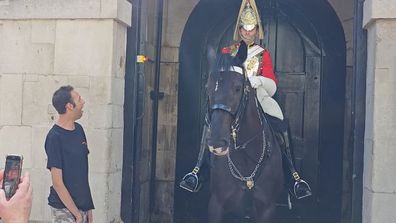 King's Guard's touching gesture for tourist