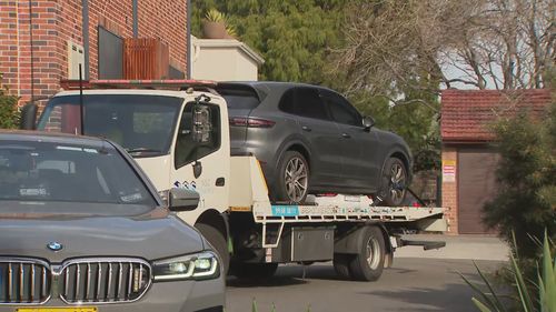 A burnt-out Porsche located on nearby James Street not long after the shooting has now been linked to the murder.