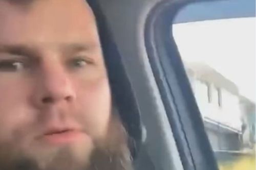 Man arrested after allegedly firing gun from moving car