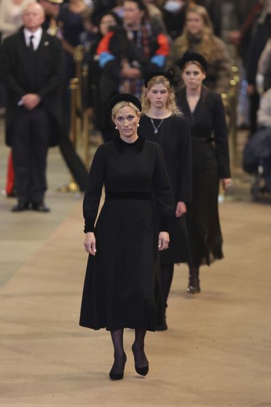 Zara Tindall, Lady Louise Windsor and Princess Beatrice leave after a wake for Queen Elizabeth II, as it lies, at Westminster Hall, at the Palace of Westminster, London, Saturday, September 17, 2022, ahead of her funeral on Monday.  (Chris Jackson/Pool Photo via AP)