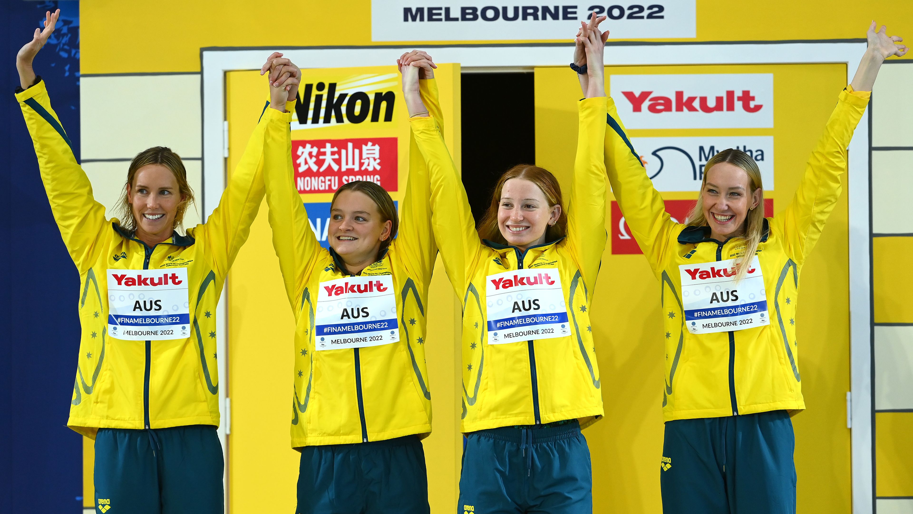 Gold medallists Emma McKeon, Chelsea Hodges, Mollie O&#x27;Callaghan and Madison Wilson celebrate during the medal ceremony.