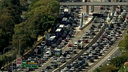 Sydney Harbour Tunnel reopens citybound after overheight truck stops near entrance
