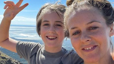 Alicia Silverstone and son Bear hiking.