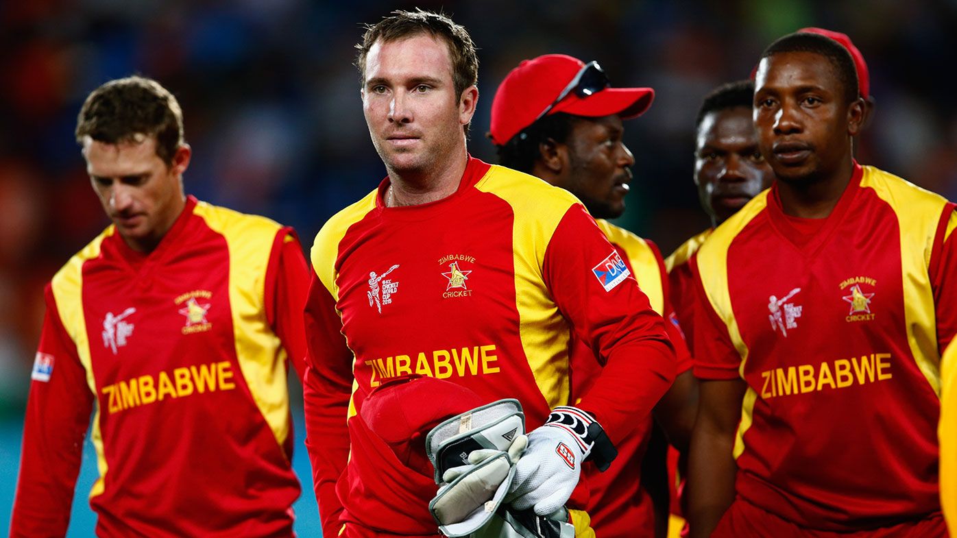  Brendan Taylor of Zimbabwe leads the team off the field at the end of the game during the 2015 ICC Cricket World Cup match between India and Zimbabwe 