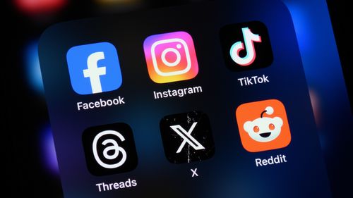 Toronto, Canada - August 22, 2024:    Popular social media apps on an Apple iPhone: Facebook, Instagram, TikTok, Threads, X (formerly Twitter), and Reddit.