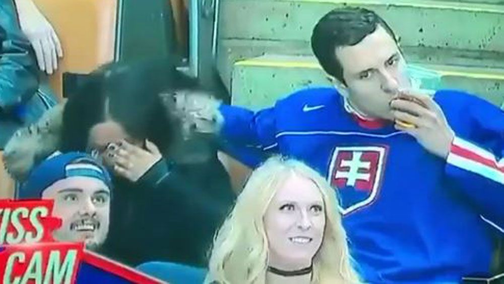 Brave soul turns Kiss Cam into Beer Kiss Cam