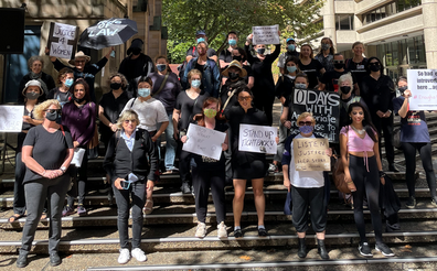 Crowds gather with their placards at March4Justice