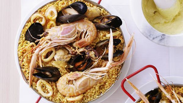 Seafood paella with alioli