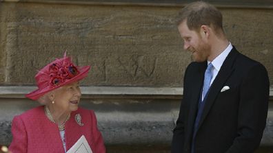 Queen Elizabeth II talks to Prince Harry as they leave after the wedding of Lady Gabriella Windsor and Thomas Kingston on May 18, 2019. 