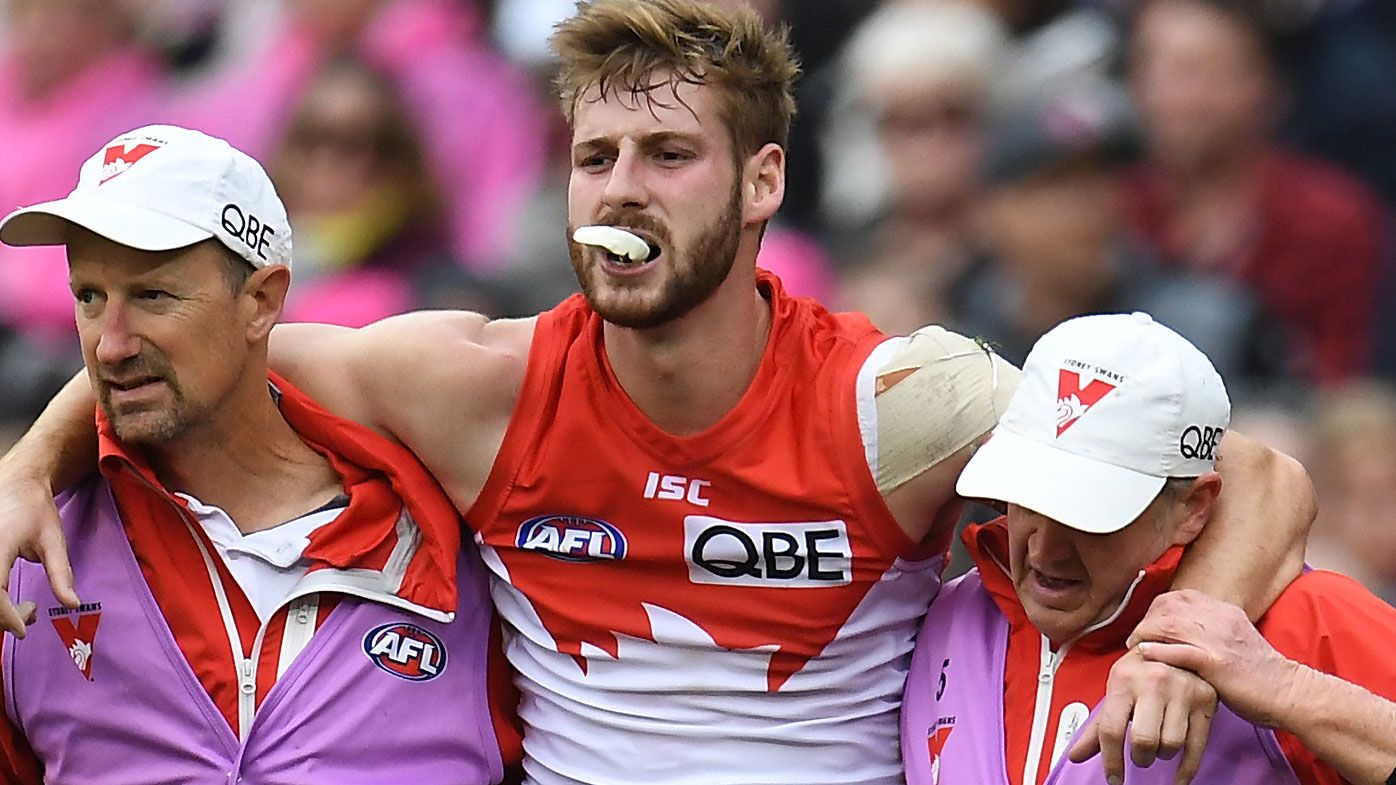 Swans defender Alex Johnson suffers suspected ACL injury against Demons