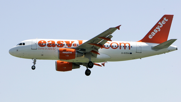 In this file photo dated Wednesday, April 23, 2008, an EasyJet jetliner lands at the Milan Linate airport, Italy. European budget airline eastJet said Thursday May 28, 2020, it plans to cut up to a third of its 15,000-strong workforce as the global aviation industry struggles to cope with the COVID-19 pandemic