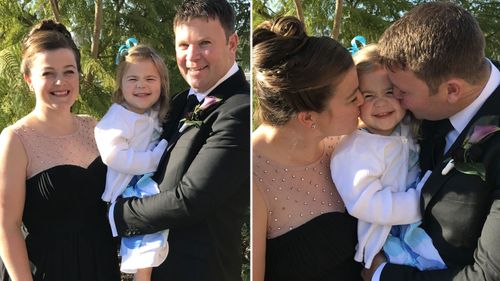 Tracey Wilson, her partner Damien and their daughter at a friend's wedding just after the mum's diagnosis.
