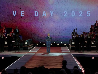King Charles III speaks on stage during a concert to mark the 80th Anniversary of VE Day at Horse Guards Parade on May 8, 2025 in London, England. 
