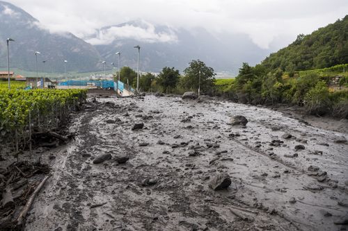 A view of damage on the banks of the Losentse River after a mudslide, in Chamoson, canton Valais, Switzerland, 12 August 2019.