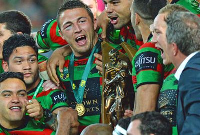 Sam Burgess soaks up the joy of victory as he finally gets his hands on the premiership trophy.