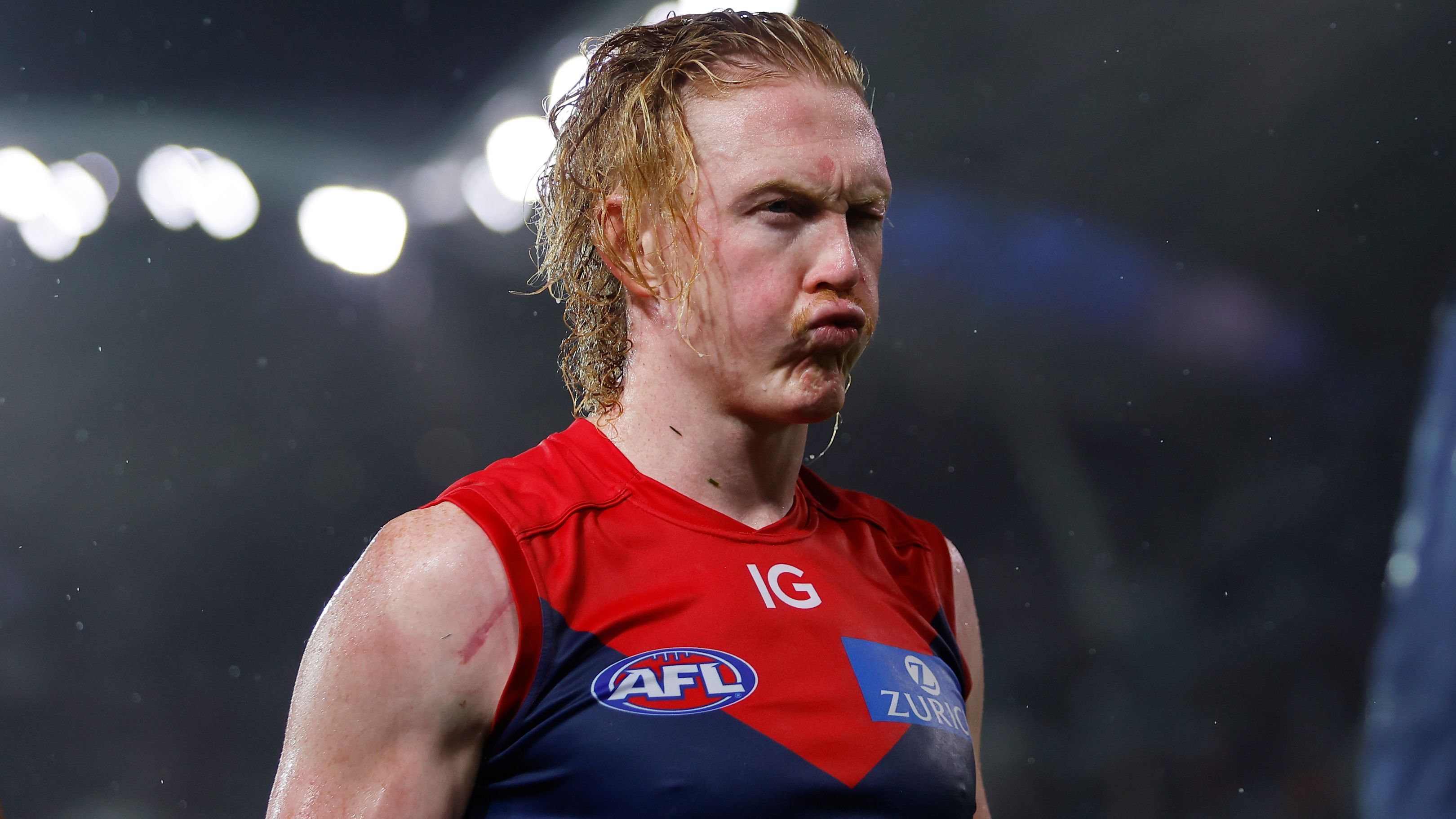 ADELAIDE, AUSTRALIA - APRIL 15: Clayton Oliver of the Demons leaves the field after a loss during the 2023 AFL Round 05 match between the Essendon Bombers and the Melbourne Demons at Adelaide Oval on April 15, 2023 in Adelaide, Australia. (Photo by Dylan Burns/AFL Photos)