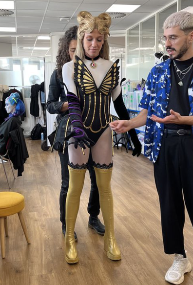 9PR: A woman backstage dressed in character ahead of performing dance from Just Dance 2024
