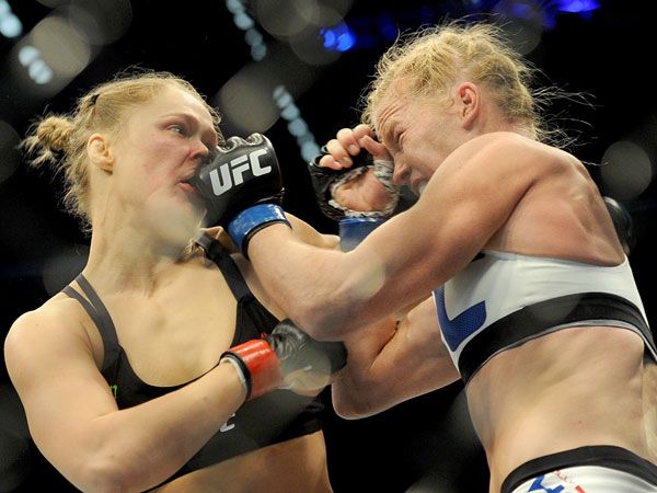 Ronda Rousey battles Holly Holm at UFC 193. (AAP)