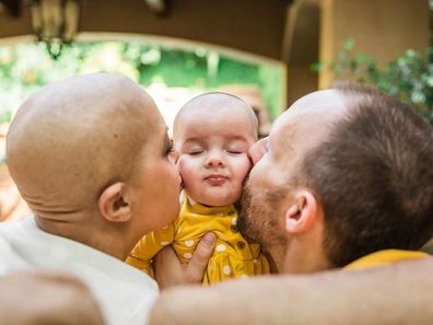 Jessica and husband Alec and their daughter Regina.