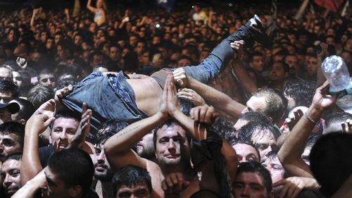 Two killed, a dozen injured in massive crowd at Argentine rock concert