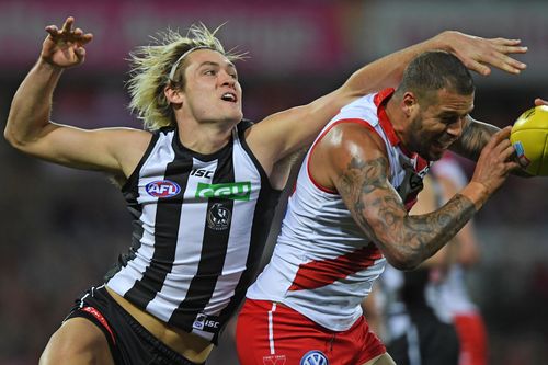 Collingwood's Darcy Moore, pictured contesting the ball with Sydney's Lance Franklin, is fighting fit and could be in for a big season.