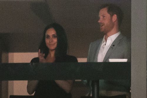 Britain's Prince Harry stands with his girlfriend Meghan Markle during the Invictus Games closing ceremony in Toronto. (AAP)