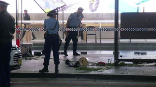 Window cleaner critical after falling three storeys from Sydney Apple store