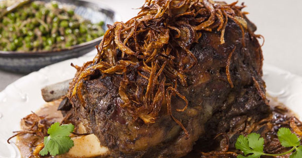Anjum Anand's spiced slow-roast lamb shoulder with edgy peas - 9Kitchen