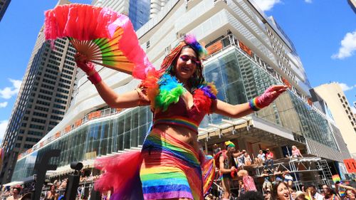 Attendees enjoy the Toronto Pride parade. (AFP)