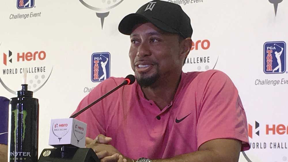 Golf: Woods cracks jokes at press conference