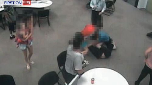 CCTV obtained by 9NEWS shows customers brawling in Centrelink offices. (9NEWS)