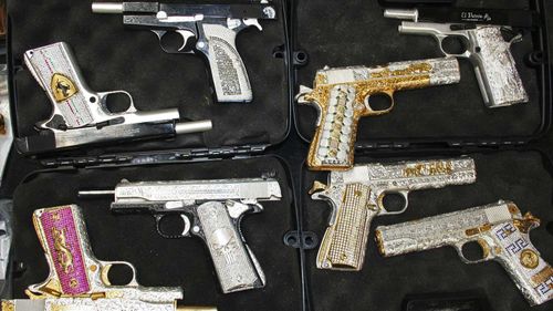 Decorated guns seized by police from the Sinaloa cartel.