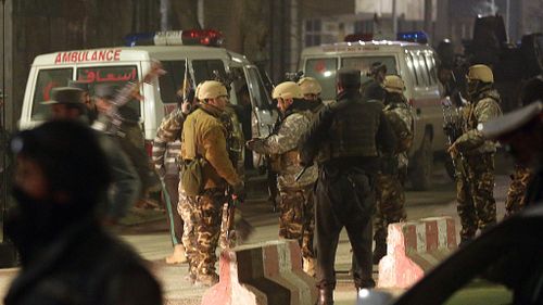 Security forces near the scene of the attack in Kabul, Afghanistan. (AAP)