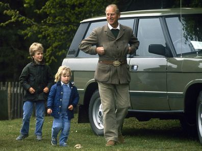Peter and Zara Phillips with the Duke of Edinburgh (Prince Philip) at the Royal Windsor Horse Show in 1985.