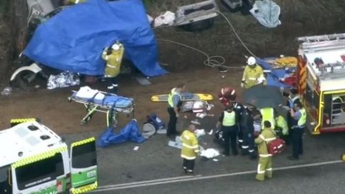Emergency services on the scene of the smash near the town of Williams in Western Australia.