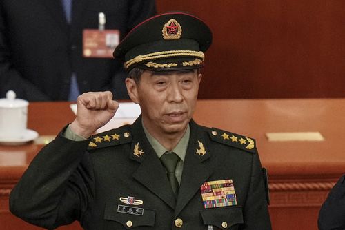Newly elected Chinese Defence Minister Gen. Li Shangfu takes his oath during a session of China's National People's Congress (NPC) at the Great Hall of the People in Beijing on March 12, 2023.  